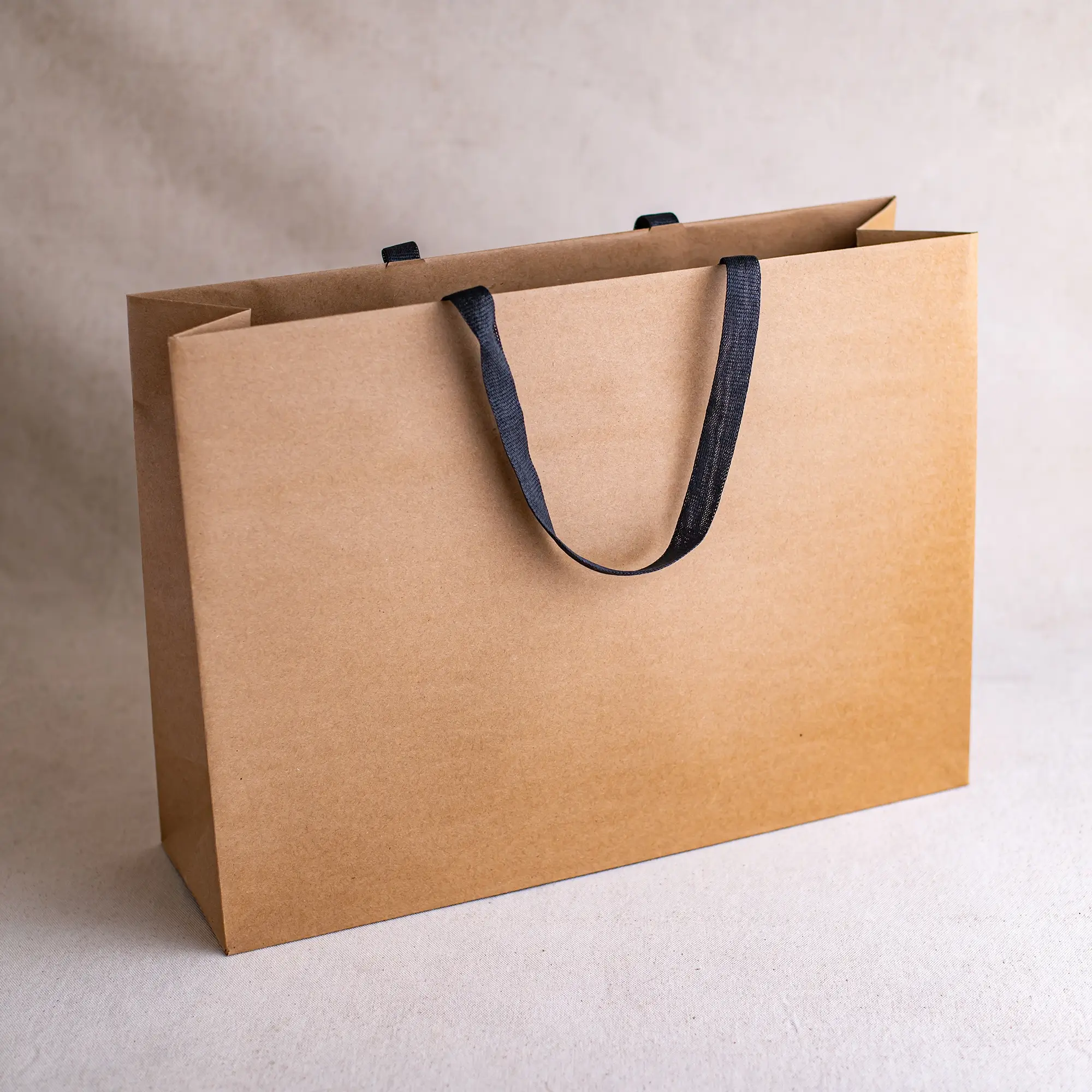 Show details for FSC® Luxury Ribbon Handle Brown Kraft Paper Bags - Plain