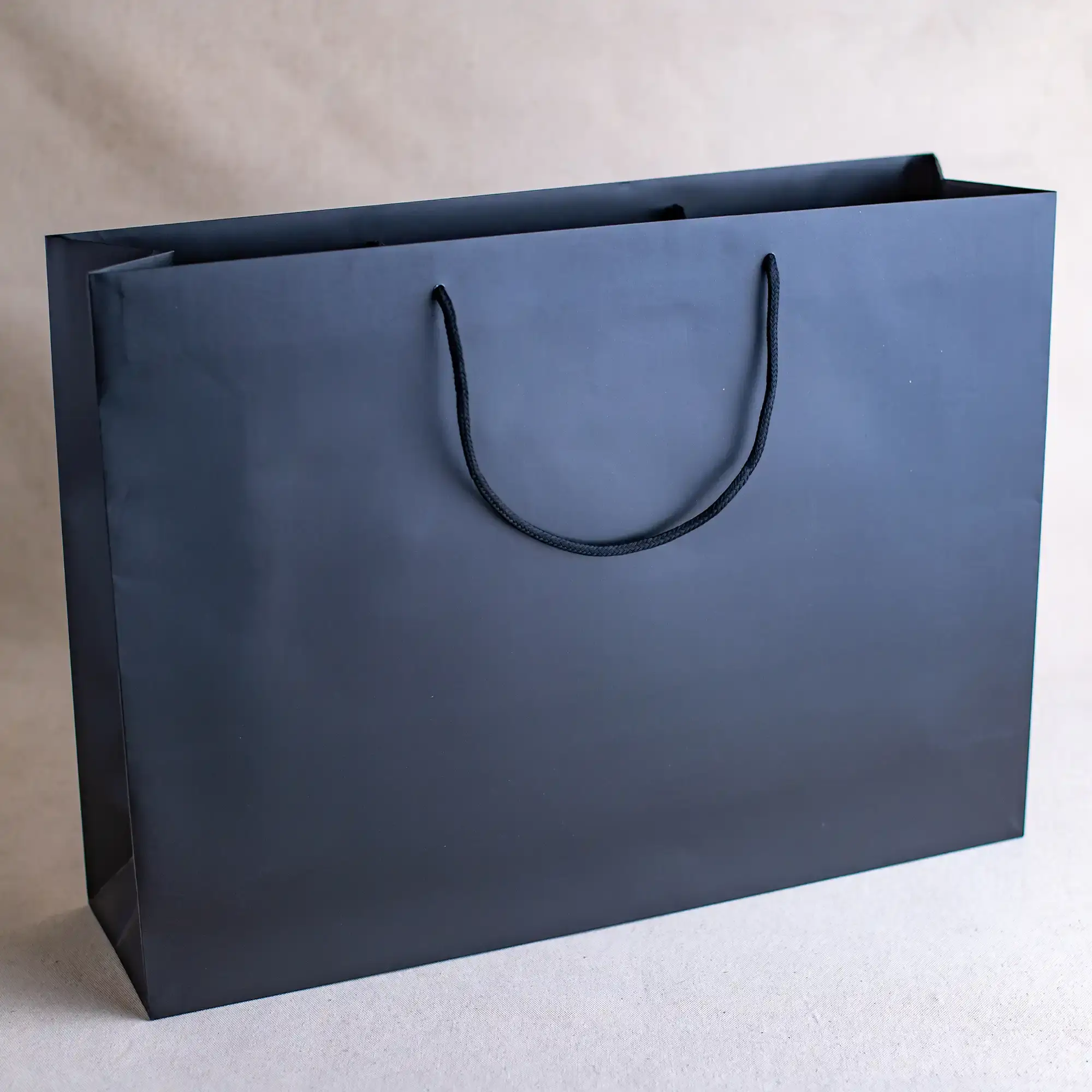 Show details for FSC® Black Luxury Laminated Rope Handle Paper Bags - Plain